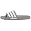 Pair of Adidas Adilette shower slides in black with white iconic three stripes.